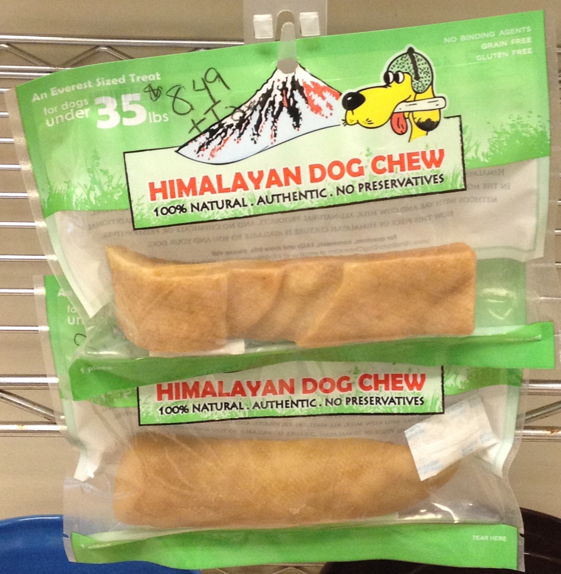 Himalayan dog chew treats for dogs under 35 lbs, featuring two chews in a clear package. Promoted as 100% natural, authentic, and preservative-free.